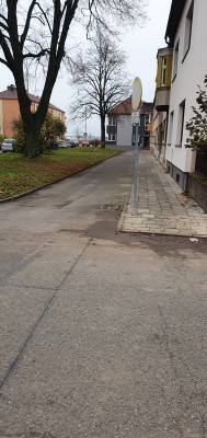 Vyasfaltování druhé poloviny obslužné komunikace na ul. Waitova